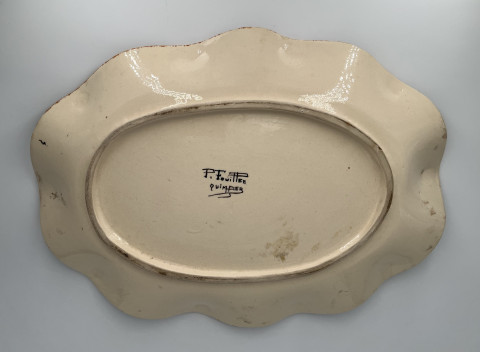 Grand plat à décor de poissons