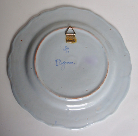 Signature PB et titrée Plogonnec au dos de la pièce