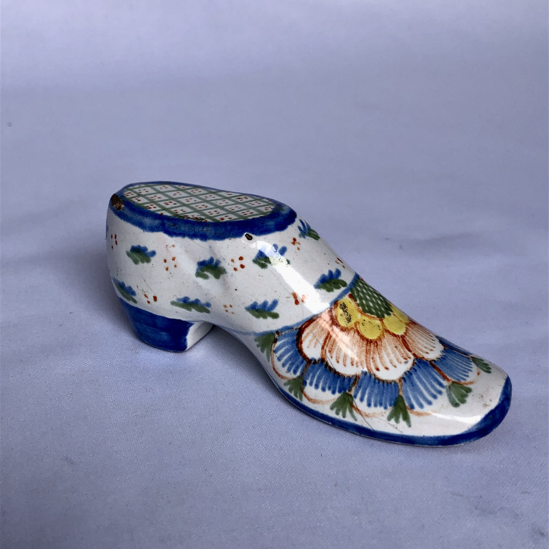 Secouette en forme de soulier