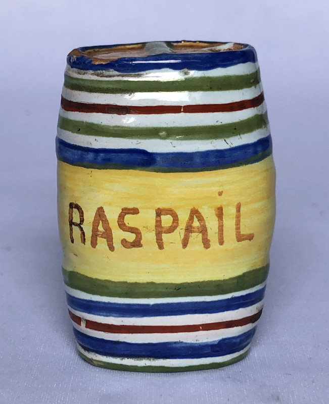 Secouette en forme de tonneau marquée Raspail
