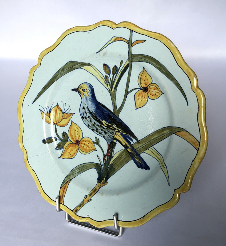 Assiette Porquier-Beau à décor d'oiseau 